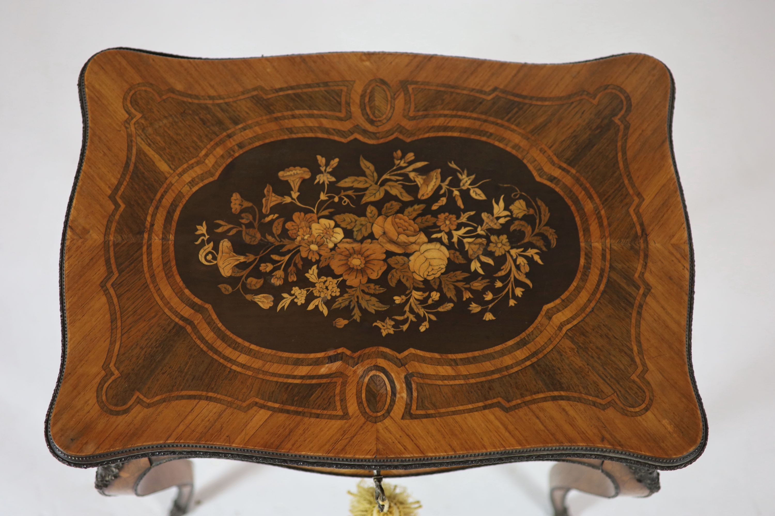 A 19th century French Louis XV style floral marquetry and kingwood poudreuse H 69cm W 59cm. D 41cm.
